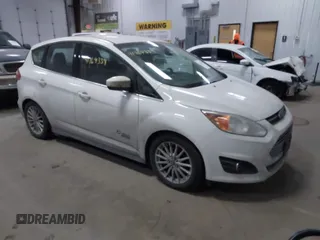 2015 Ford C-Max SEL z VIN 1FADP5CU3FL106299, wystawiony jako IAAI lot #41764339 z przebiegiem 104 025 mil mil oraz . Historia ofert i sprzedaży dostępna na DreamBid. Obrazek 1.