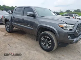 2018 Toyota Tacoma SR with VIN 5TFCZ5AN4JX133752, listed as a IAAI auction lot 42600807 with 66,906 mi miles and . Bid and sale history available at DreamBid. Image 1.