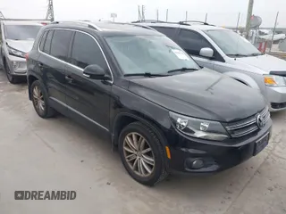 2012 Volkswagen Tiguan SE with VIN WVGAV7AX9CW611202, listed as a IAAI auction lot 41944210 with 118,002 mi miles and . Bid and sale history available at DreamBid. Image 1.