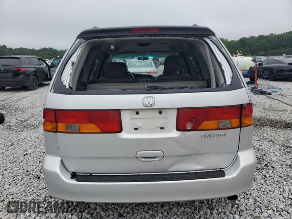 2004 Honda Odyssey EX-L with VIN 5FNRL18044B069774, listed as a Copart auction lot 57096535 with 165,307 mi miles and Salvage title. Bid and sale history available at DreamBid. Image 6.
