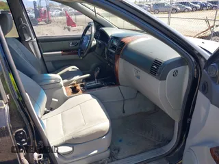 2004 Kia Sorento LX with VIN KNDJC733945245222, listed as a IAAI auction lot 42056958 with 272,128 mi miles. Bid and sale history available at carsss.com. Image 5.