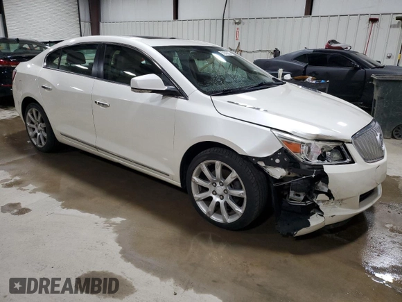 2012 Buick LaCrosse Touring with VIN 1G4GJ5E3XCF137276, listed as a Copart auction lot 51649255 with 102,265 mi miles and Salvage title. Bid and sale history available at DreamBid. Image 4.