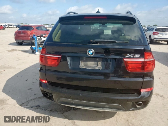 2012 BMW X5 35i с VIN 5UXZV4C52CL988794, выставлен на аукционе Copart как лот 61688485 с пробегом Не указан миль и Чистый • Clean title. История ставок и продаж доступна на DreamBid. Изображение 6.