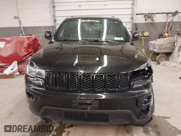 2018 Jeep Grand Cherokee Laredo E with VIN 1C4RJFAG0JC154937, listed as a IAAI auction lot 41966764 with 85,415 mi miles and . Bid and sale history available at DreamBid. Image 13.