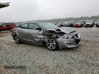 2016 Nissan Maxima SL with VIN 1N4AA6AP7GC387273, listed as a Copart auction lot 54103765 with 133,337 mi miles and Salvage Title. Bid and sale history available at DreamBid. Image 13.