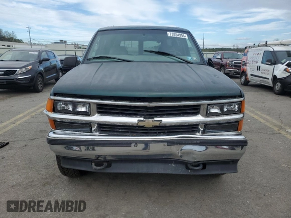 1999 Chevrolet Suburban with VIN 1GNFK16R9XJ516000, listed as a Copart auction lot 73854994 with 263,079 mi miles and Salvage Title. Bid and sale history available at carsss.com. Image 5.
