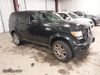 2011 Dodge Nitro Heat with VIN 1D4PU4GX0BW517654, listed as a IAAI auction lot 41715627 with 107,954 mi miles. Bid and sale history available at carsss.com. Image 1.