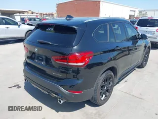 2021 BMW X1 sDrive28i with VIN WBXJG7C07M3M65841, listed as a IAAI auction lot 41877032 with 79,817 mi miles and . Bid and sale history available at DreamBid. Image 4.