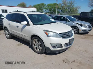 2013 Chevrolet Traverse LTZ z VIN 1GNKVLKD8DJ107168, wystawiony jako IAAI lot #42242078 z przebiegiem 271 640 mil mil oraz . Historia ofert i sprzedaży dostępna na DreamBid. Obrazek 1.