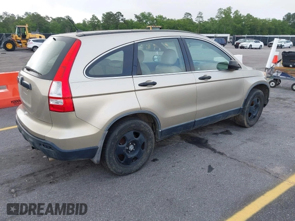 2007 Honda CR-V LX with VIN JHLRE38327C070572, listed as a IAAI auction lot 42128857 with 235,809 mi miles. Bid and sale history available at carsss.com. Image 4.