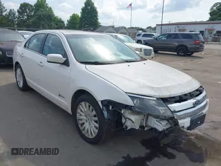 2012 Ford Fusion Hybrid с VIN 3FADP0L39CR216555, выставлен на аукционе IAAI как лот 42506669 с пробегом 171 346 миль миль и . История ставок и продаж доступна на DreamBid. Изображение 1.