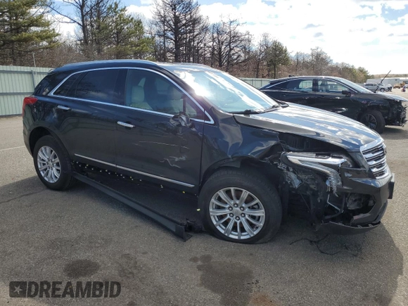 2019 Cadillac XT5 AWD z VIN 1GYKNBRSXKZ194538, wystawiony jako Copart lot #47940475 z przebiegiem 47 571 mil mil oraz Szkoda całkowita • Salvage title. Historia ofert i sprzedaży dostępna na DreamBid. Obrazek 4.