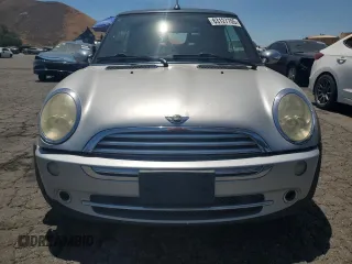 2006 MINI Convertible with VIN WMWRF33576TG16056, listed as a Copart auction lot 63127705 with 108,654 mi miles and Salvage title. Bid and sale history available at DreamBid. Image 5.