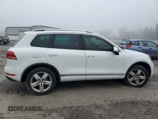 2012 Volkswagen Touareg Sport with VIN WVGEF9BP2CD010668, listed as a Copart auction lot 55306485 with 166,255 mi miles and Clean Title. Bid and sale history available at DreamBid. Image 3.