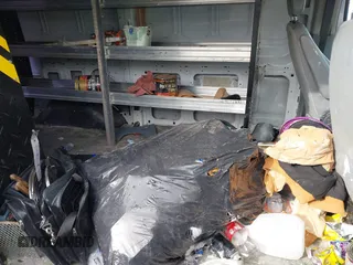 2015 Ford Transit Cargo with VIN 1FTNE1ZM1FKA69893, listed as a IAAI auction lot 41330596 with 234,974 mi miles. Bid and sale history available at carsss.com. Image 8.