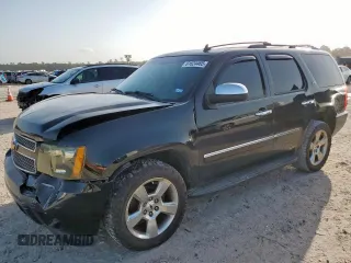 2010 Chevrolet Tahoe LTZ with VIN 1GNUCCE0XAR183124, listed as a Copart auction lot 61624465 with 168,704 mi miles and Salvage title. Bid and sale history available at DreamBid. Image 1.