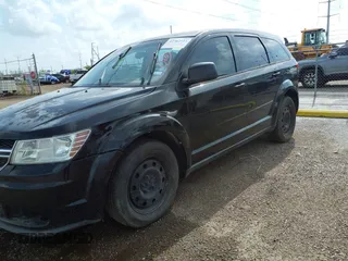 2014 Dodge Journey SE with VIN 3C4PDCAB7ET116651, listed as a IAAI auction lot 42762513 with 197,808 mi miles and . Bid and sale history available at DreamBid. Image 2.