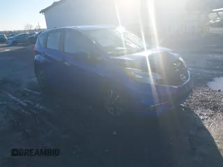 2015 Nissan Note S z VIN 3N1CE2CP2FL357472, wystawiony jako IAAI lot #41215110 z przebiegiem 104 091 mil mil oraz . Historia ofert i sprzedaży dostępna na DreamBid. Obrazek 1.