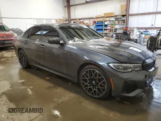 2022 BMW 3 Series M340i xDrive with VIN WBA5U9C02NFL66019, listed as a Copart auction lot 86330044 with 42,394 mi miles and Salvage Title. Bid and sale history available at DreamBid. Image 4.