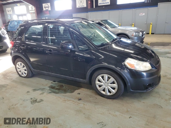 2010 Suzuki SX4 z VIN JS2YB5A36A6300326, wystawiony jako Copart lot #84372804 z przebiegiem 51 036 mil mil oraz Tytuł czysty. Historia ofert i sprzedaży dostępna na DreamBid. Obrazek 4.