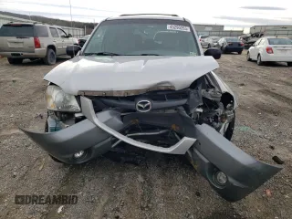 2002 Mazda Tribute LX with VIN 4F2CU08122KM01491, listed as a Copart auction lot 45290265 with 134,141 mi miles and Salvage Title. Bid and sale history available at carsss.com. Image 5.