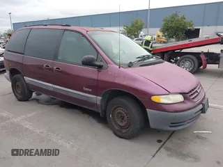 1999 Plymouth Voyager z VIN 2P4GP45R8XR382654, wystawiony jako IAAI lot #41576604 z przebiegiem 162 219 mil mil oraz . Historia ofert i sprzedaży dostępna na DreamBid. Obrazek 1.