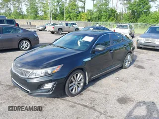 2015 Kia Optima EX with VIN KNAGN4AD7F5090393, listed as a IAAI auction lot 42632332 with 205,227 mi miles and . Bid and sale history available at DreamBid. Image 2.