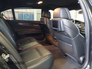 2011 BMW 7 Series 750Li xDrive with VIN WBAKC8C58BC432517, listed as a IAAI auction lot 41874352 with 125,288 mi miles and . Bid and sale history available at DreamBid. Image 8.
