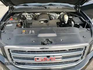 2016 GMC Yukon XL SLE with VIN 1GKS1FKCXGR479666, listed as a Copart auction lot 46640135 with 106,345 mi miles and Salvage Title. Bid and sale history available at carsss.com. Image 14.