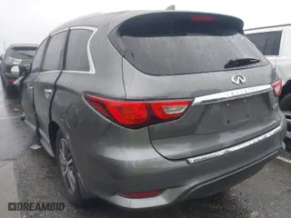 2016 Infiniti QX60 with VIN 5N1AL0MN6GC532519, listed as a IAAI auction lot 41558124 with 123,814 mi miles. Bid and sale history available at carsss.com. Image 3.