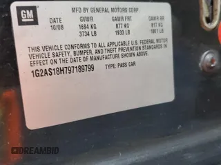 2009 Pontiac G5 z VIN 1G2AS18H797189799, wystawiony jako Copart lot #57909205 z przebiegiem 164 862 mil mil oraz Szkoda całkowita • Salvage title. Historia ofert i sprzedaży dostępna na DreamBid. Obrazek 12.