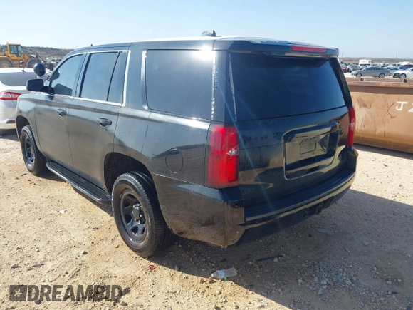 2015 Chevrolet Tahoe Commercial z VIN 1GNLC2EC7FR575386, wystawiony jako IAAI lot #41836137 z przebiegiem 143 231 mil mil oraz . Historia ofert i sprzedaży dostępna na DreamBid. Obrazek 3.