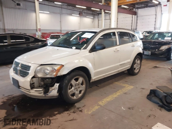2009 Dodge Caliber SXT with VIN 1B3HB48A89D116734, listed as a IAAI auction lot 41959281 with 209,136 mi miles and . Bid and sale history available at DreamBid. Image 18.