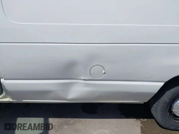 1998 Ford Econoline Cargo with VIN 1FTRE1420WHB15038, listed as a IAAI auction lot 41826051 with 338,809 mi miles. Bid and sale history available at carsss.com. Image 18.