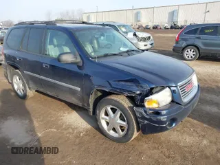 2008 GMC Envoy SLE2 with VIN 1GKDT13S082236289, listed as a IAAI auction lot 41793782 with 197,472 mi miles. Bid and sale history available at carsss.com. Image 1.