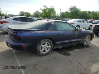 1999 Pontiac Firebird Firebird with VIN 2G2FS22K4X2202867, listed as a Copart auction lot 54529755 with Not provided miles and Salvage title. Bid and sale history available at DreamBid. Image 3.
