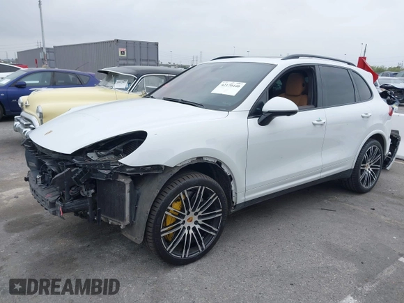 2016 Porsche Cayenne Turbo z VIN WP1AC2A20GLA85193, wystawiony jako IAAI lot #42170440 z przebiegiem 95 999 mil mil oraz . Historia ofert i sprzedaży dostępna na DreamBid. Obrazek 18.