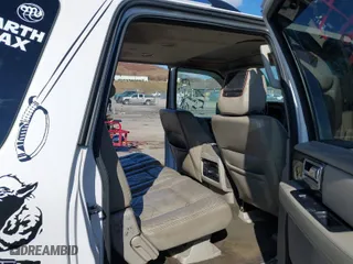2015 Lincoln Navigator L with VIN 5LMJJ3JT4FEJ08010, listed as a IAAI auction lot 41490791 with 206,407 mi miles. Bid and sale history available at carsss.com. Image 8.