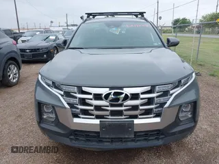 2023 Hyundai Santa Cruz SEL z VIN 5NTJCDAE6PH041342, wystawiony jako IAAI lot #42192227 z przebiegiem Nie podano mil oraz . Historia ofert i sprzedaży dostępna na DreamBid. Obrazek 6.