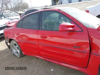 2002 Pontiac Grand Am GT with VIN 1G2NW52E52C174257, listed as a IAAI auction lot 41797928 with 250,020 mi miles. Bid and sale history available at carsss.com. Image 14.