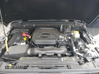 2023 Jeep Wrangler Sport with VIN 1C4HJXDN9PW638737, listed as a Copart auction lot 71367284 with 12,054 mi miles and Salvage Title. Bid and sale history available at DreamBid. Image 11.