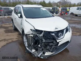 2016 Nissan Rogue S with VIN JN8AT2MV2GW139801, listed as a IAAI auction lot 41593327 with 106,274 mi miles. Bid and sale history available at carsss.com. Image 1.