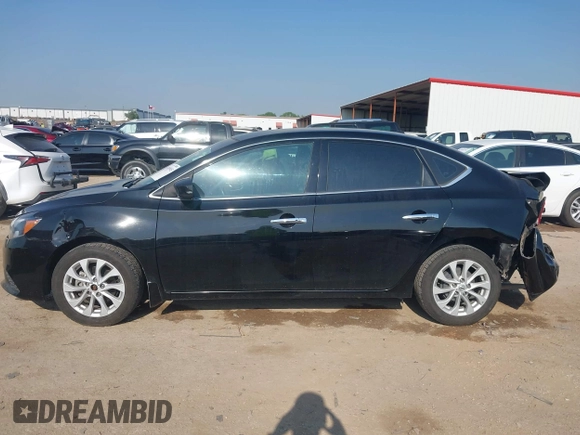 2019 Nissan Sentra S z VIN 3N1AB7AP3KY218433, wystawiony jako IAAI lot #42049945 z przebiegiem 108 874 mil mil oraz . Historia ofert i sprzedaży dostępna na DreamBid. Obrazek 14.