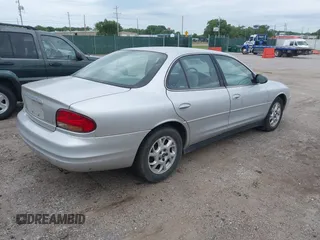 2002 Oldsmobile Intrigue GX z VIN 1G3WH52H22F149397, wystawiony jako IAAI lot #42265108 z przebiegiem 107 834 mil mil oraz . Historia ofert i sprzedaży dostępna na DreamBid. Obrazek 4.