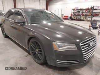 2011 Audi A8 z VIN WAURVAFD1BN016929, wystawiony jako IAAI lot #42144918 z przebiegiem 171 874 mil mil oraz . Historia ofert i sprzedaży dostępna na DreamBid. Obrazek 1.