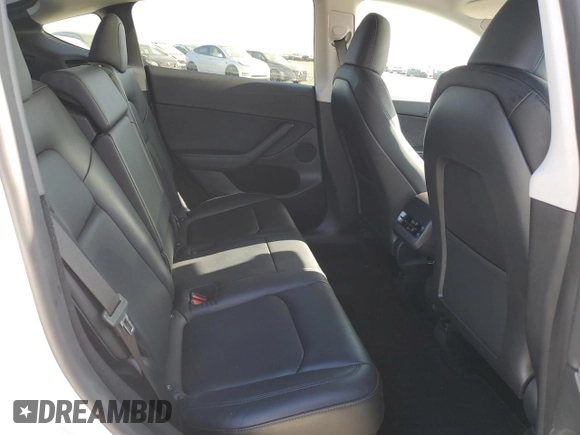 2024 Tesla Model Y Long Range с VIN 7SAYGDEE8RF983067, выставлен на аукционе Copart как лот 61217015 с пробегом 57 082 миль миль и Списание • Salvage title. История ставок и продаж доступна на DreamBid. Изображение 11.