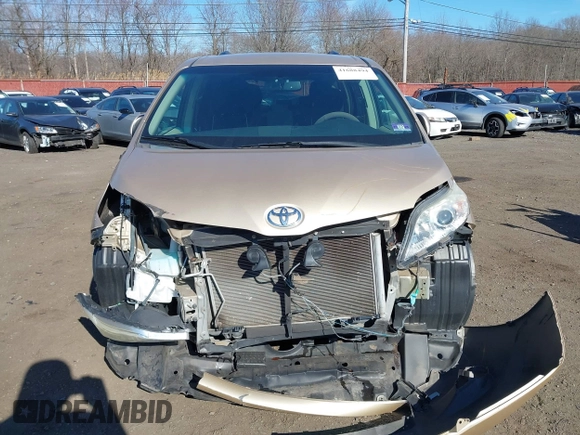 2011 Toyota Sienna LE AAS with VIN 5TDKK3DC0BS168052, listed as a IAAI auction lot 41688494 with 49,095 mi miles. Bid and sale history available at carsss.com. Image 12.