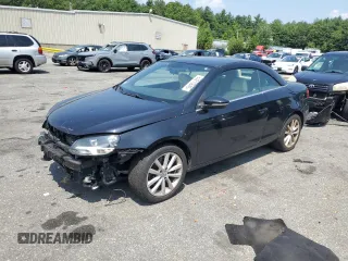 2014 Volkswagen Eos Sport z VIN WVWBW8AHXEV001404, wystawiony jako Copart lot #63213645 z przebiegiem 118 301 mil mil oraz Czysty tytuł • Clean title. Historia ofert i sprzedaży dostępna na DreamBid. Obrazek 1.