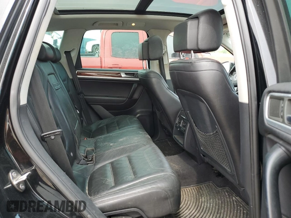 2012 Volkswagen Touareg Sport with VIN WVGFF9BP8CD001039, listed as a Copart auction lot 57764125 with 128,540 mi miles and Clean title. Bid and sale history available at DreamBid. Image 11.