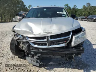 2013 Dodge Journey American Value with VIN 3C4PDCAB1DT715799, listed as a Copart auction lot 52404815 with 185,559 mi miles and Salvage Title. Bid and sale history available at DreamBid. Image 5.